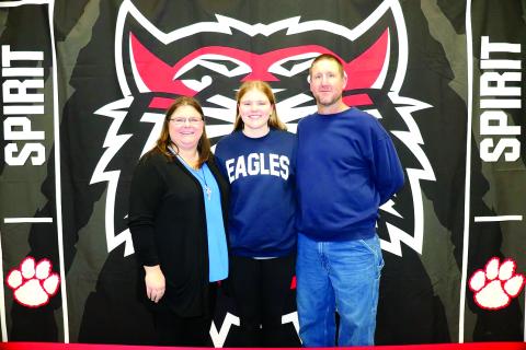Photo courtesy of Von Watts. Rabun County senior Chloe Shirley poses with her parents, Maria and Josh on Jan. 23 at her signing day ceremony on Rabun County’s campus. Shirley signed to continue her athletic and academic careers at Georgia Southern University East Georgia. Shirley played first and third base for the Lady Cats.