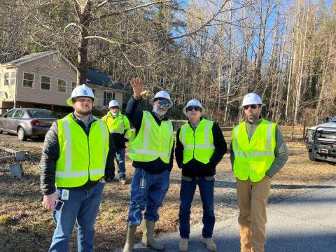 Photos courtesy Rep. Andrew Clyde’s Office. U.S. Rep. Andrew Clyde (second from right) gets a firsthand look at Georgia Power’s restoration efforts.
