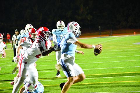 Wesley Branch/The Clayton Tribune. Rabun County senior defensive lineman TJ Hibler sacks Providence Christian Academy quarterback Riley Braiden in Rabun County’s 62-21 win over PCA on Sept. 26, 2026. Hibler announced his commitment to Cumberland University last week. 
