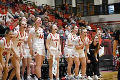 Wesley Branch/The Clayton Tribune. The Rabun County girls basketball bench celebrates a basket in Rabun County’s 66-46 win over Providence Christian Academy on Feb. 4. The Lady Cats are 19-4 with two games remaining in the regular season. 