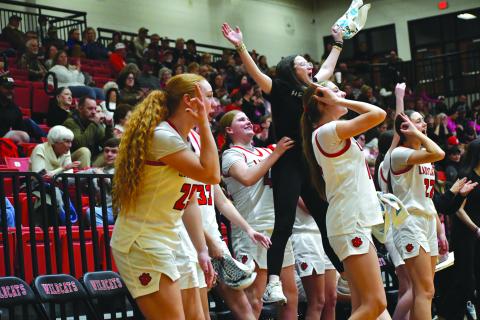 Wesley Branch/The Clayton Tribune. The Rabun County bench erupts after a made 3-pointer in the Lady Cats’ 68-26 win over Commerce on Feb. 12. The Lady Cats are the No. 1 seed in this week’s region tourney, being played at Piedmont University. 
