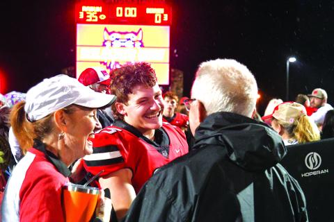 Enoch Autry/The Clayton Tribune. Senior Reid Giles and his Wildcat teammates were all smiles after Rabun County’s Nov. 21 playoff shutout of Berrien County to reach the Elite Eight. In the game, Giles had 175 yards rushing, an interception and a blocked field goal. The All-State player now will play collegiately at Erskine College in Due West, S.C.