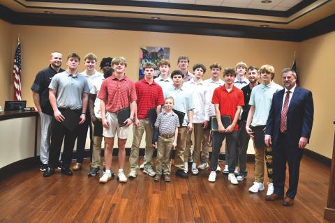 Megan Horn/The Clayton Tribune. The Rabun County High School Boys basketball team was recognized and congratulated for their Class A Division I state championship win during Monday’s Board of Education meeting. The team captured its first state title win with its 52-43 defeat of Southwest in a loud and packed Macon Coliseum on March 13. 