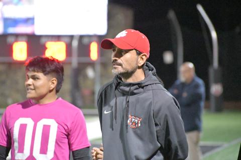 Wesley Branch/The Clayton Tribune. Rabun County head boys soccer coach Cameron Heyen watches his team from the sideline in its 7-3 March 6 win at home over Elbert County. The victory marked Heyen’s first win as the boys head coach. 