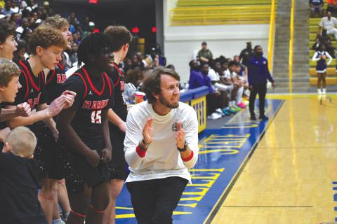 Wesley Branch/The Clayton Tribune. Rabun County head coach David Adcock implores his team from the sideline in the Wildcats’ 70-59 win over Fitzgerald in the Final Four March 7. The Wildcats now face Southwest March 13 for the state title. 