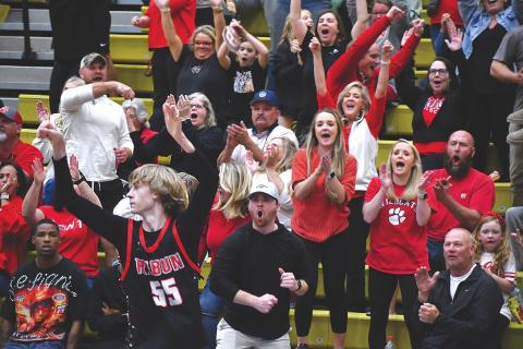 Wesley Branch/The Clayton Tribune. The Rabun County crowd celebrates after a made 3-pointer by Wildcat freshman Trace Adcock late in the fourth quarter of their 70-59 win over Fitzgerald in the Final Four on March 7 at Fort Valley State University. Adcock ranks No. 21 in the country in made 3-pointers this season according to MaxPreps. 