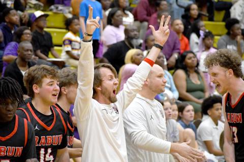 Wesley Branch/The Clayton Tribune. Rabun County head coach David Adcock celebrates as the clock winds down in Rabun County’s 70-59 Final Four victory over Fitzgerald at Fort Valley State University on March 7. The Wildcats are headed to the state championship for the first time in program history. 