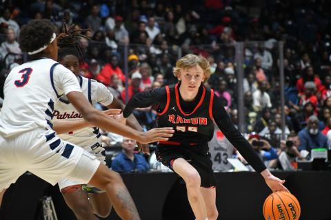 Wesley Branch/The Clayton Tribune. Rabun County freshman Trace Adcock drives to the basket in Rabun County's 52-43 state championship win over Southwest on March 13 at the Macon Coliseum.