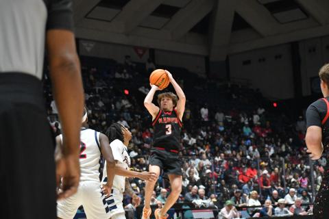 Wesley Branch/The Clayton Tribune. Wildcat senior Huey Blalock, a Navy basketball commit, elevates for his shot against Southwest in the state title game on March 13 in the Macon Coliseum. Blalock was the game’s leading scorer with 29.