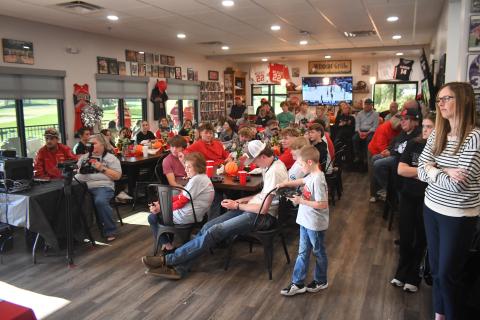 Wesley Branch/The Clayton Tribune. The community packed the Wildcat Grill March 19 for the chance to personally congratulate the RCHS boys basketball team on winning the state title. The event was broadcast live on Wildcat Sports LIVE.