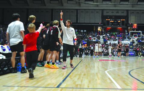 Enoch Autry/The Clayton Tribune. In the first half of the Wildcats’ state championship game in the Macon Coliseum, head coach David Adcock signals the No. 1. The boys basketball team would conclude the 2025-2026 season with the top ranking after rolling to a 30-2 record and the Class A Division I title. 