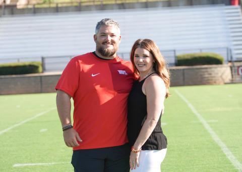 Submitted Photo. Jake Boldin stands with his wife Abby. Boldin has been hired as Rabun County’s new tight ends coach, special teams coordinator and director of football operations for the 2026-2027 school year.