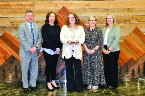Submitted. Angel McCrackin was honored as the 2026 recipient of the Philip Wright Award for her dedication to improving educational outcomes for students with disabilities. Pictured are Superintendent Steven Cole, left; Renea Jarrard, student services; McCrackin; Meadow Krockum, director of student services; and Kelly McKay, assistant superintendent.