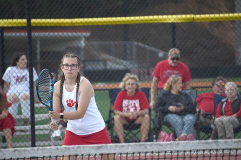 Wesley Branch/The Clayton Tribune. Rabun County senior Caroline Marshall awaits a serve during her match versus Commerce on April 2 in Rabun County’s senior night win. Marshall is the lone senior on the RCHS girls tennis team. 
