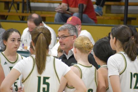 Wesley Branch/The Clayton Tribune. Rabun Gap athletic director and girls head basketball coach Dale Earnhardt addresses his team during a timeout in Rabun Gap’s 59-27 win over Carolina Day on Jan. 8. Earnhardt is leaving Rabun Gap after 19 years at the school, 13 of which was spent as the athletic director. 
