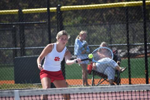 Wesley Branch/The Clayton Tribune. Rabun County’s Mia Potts loads up to strike the ball in her singles match against Dodge County on April 21 at Rabun County High School. Potts secured the match-clinching victory by winning her singles match on No. 2 singles. 