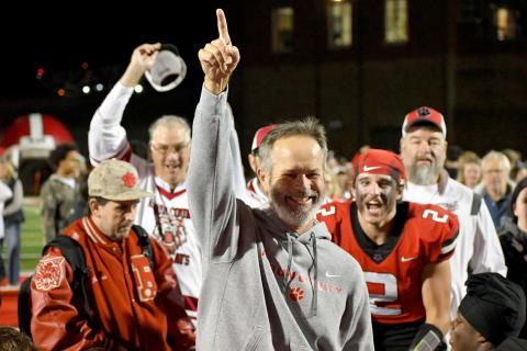 Wesley Branch/The Clayton Tribune. RCHS head football coach Ranch Gillespie celebrates with his team following the Wildcats’ 35-0 playoff win over Berrien County on Nov. 21. The Future Wildcat Kids Camp is set for May 18-19 at the stadium.