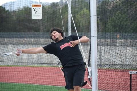 Photo by Wesley Branch/The Clayton Tribune. Rabun senior JP Lopez competes in the discus at the Bo James invitational at Rabun County High School on April 2. Lopez qualified for the state championship meet for the discus and shot put following his performance at the sectional meet at Bremen High School on May 4. 
