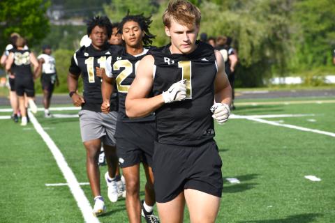 Wesley Branch/The Clayton Tribune. Rabun Gap Class of 2028 linebacker Jay Schell warms up for Rabun Gap’s May 7 college coaches social. Schell has 36 Division I offers, with LSU most recently offering him a scholarship. 