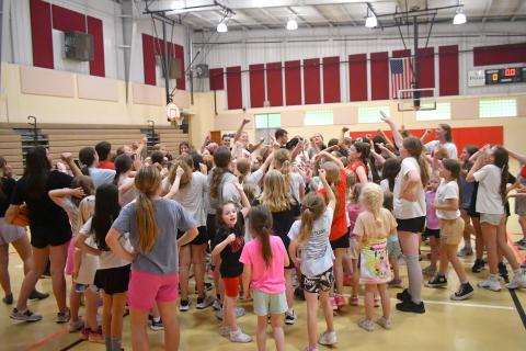 Wesley Branch/The Clayton Tribune. The Rabun County Lady Cat players, coaches and campers wrap up day one of Lady Cats basketball camp on May 11 at the Rabun County Recreation Department. Over 100 campers were in attendance during the week.