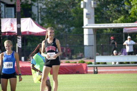 Wesley Branch/The Clayton Tribune. Rabun County freshman Kinley Jones smiles after receiving her medal for finishing seventh place in the 3200 meter race at the GHSA state championship meet on May 12 in Athens. 