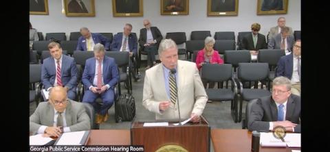 Submitted. Rabun County Commission Chairman Greg James talks before the panel at the PSC Hearing about storms.
