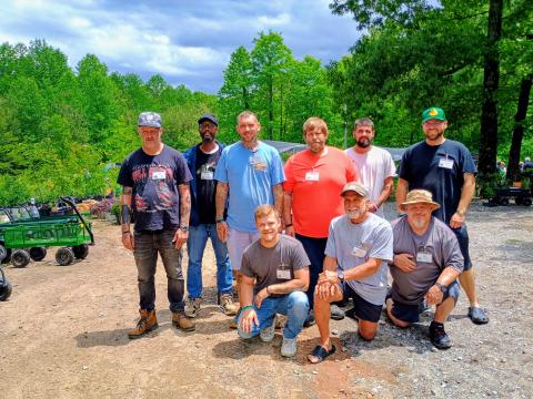 Megan Horn/The Clayton Tribune. Victory Home residents Joseph Coalson, Jeff Pless, Michael Flowers, Anthony Powell, Keelan May, Jeff Smith, Johnathon Cowart, Hunter Blackburn and Bruce Burch worked alongside expert gardeners from Headwaters Master Gardeners Association to prepare for the May 6-May 9 Spring Plant Sale at the Victory Home Greenhouse, located at 157 Victory Home Lane in Tallulah Falls. 