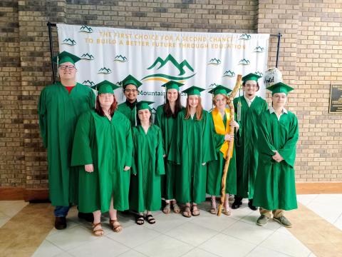 Megan Horn/The Clayton Tribune. Rabun Mountain Education Class of 2026 graduates are front from left: Nova Sayra Star Harkins, Charlotte Holcomb, Anna Beth Richardson, Adaira Joelee Day and Oscar Korigan Valdes. Back row from left: Cooper Lathan Powell, Emerald Vaylin Pittman, Ora Bella Davis and Ryan Douglas Wayne Eker. Not pictured are James Oliver McDade, Paxton Lee Mooney and James Cannon Ramey. 