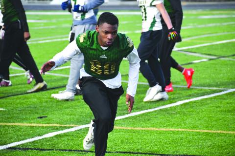 Wesley Branch/The Clayton Tribune. Rabun Gap junior defensive back Elias Willingham goes through drills during Rabun Gap’s college coaches social in January. Willingham is one of nine Division I commits in Rabun Gap’s 2027 class. 