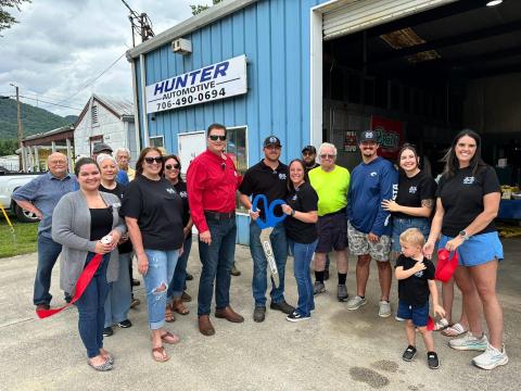 Photo courtesy of Forward Rabun/Rabun County Chamber of Commerce. The ribbon is cut for Hunter Automotive in Clayton for the business’ grand opening on July 10. 