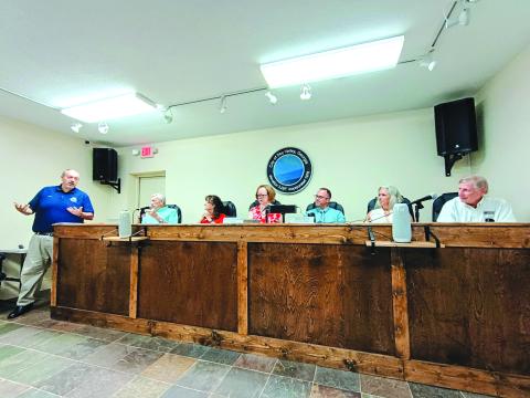 Megan Horn/The Clayton Tribune. Sky Valley City Manager Jason Streetman, left, gives his last report as city manager at the July 21 regular council meeting. Pictured right are Council Member Tony Allred, Council President Beth Pence, Mayor Benita Cotton-Orr, and council members Jesse Price, CareySue Beasley and Jim Curtis. Streetman’s last day as Sky Valley’s city manager is July 31. His start date as Clarkesville city manager is Aug. 3. 