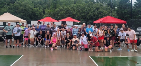 Submitted. Dozens of pickleball players from Rabun County and surrounding communities braved the showers to compete in a Team Challenge tournament on Saturday, July 25. The players and spectators contributed $1,000 to the Sid Weber Cancer Fund from the pickleball fundraiser. The pickleball courts on the Rabun County Recreation Department property in Tiger have been used extensively since their opening.