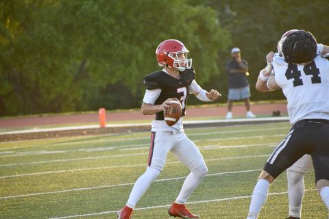 Wesley Branch/The Clayton Tribune. Rabun County’s Cooper Kowalsky looks downfield for an open receiver during the Wildcats’ spring game versus White County on May 15. Kowalsky is entering his first season as RCHS’s starting QB.