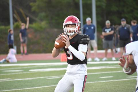 Wesley Branch/The Clayton Tribune. Rabun County sophomore quarterback Cooper Kowalsky looks downfield for an open receiver in the Wildcats’ spring game versus White County on May 15. Kowalsky will be Rabun County’s starting quarterback this season.