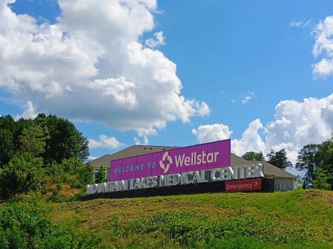Megan Horn/The Clayton Tribune. Motorists will notice new signage saying “Welcome to Wellstar Mountain Lakes Medical Center” as the local hospital was officially acquired by Wellstar Health System. Wellstar Health System and Mountain Lakes Medical Center announced on Monday, Aug. 10, Wellstar has completed its acquisition of the hospital. 