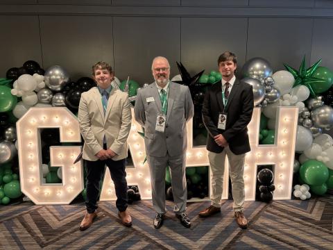 Photo courtesy of Rabun County 4-H. Rabun County 4-H members Wesley McCrackin, left, and Peyton Hicks, right, represented their county at the 83rd Annual Georgia 4-H State Congress, held in Atlanta, on July 21-24. Pictured center is Rabun County 4-H Educator Joey Eller. 