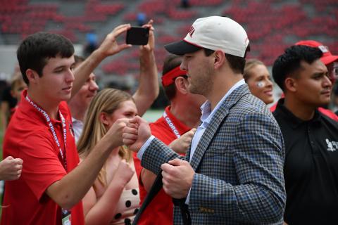 Wesley Branch/The Clayton Tribune. Starting quarterback Gunner Stockton is greeted by fans and fellow students during his “Dawg Walk” prior to the Ole Miss game in Athens on Oct. 18, 2025.
