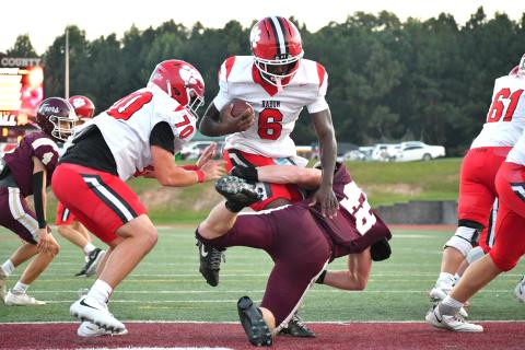 Enoch Autry/The Clayton Tribune. Senior running back JK Fruster goes in for the first of his three rushing touchdowns as the Wildcats move to 2-0 on the season.