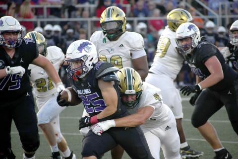 Wesley Branch/The Clayton Tribune. Rabun Gap linebacker Jay Schell brings down Brownsburg’s Brady Lewis during Rabun Gap’s 31-15 loss versus Brownsburg on Aug. 28. The Eagles will host No. 6 Baylor this Friday, Sept. 4. 