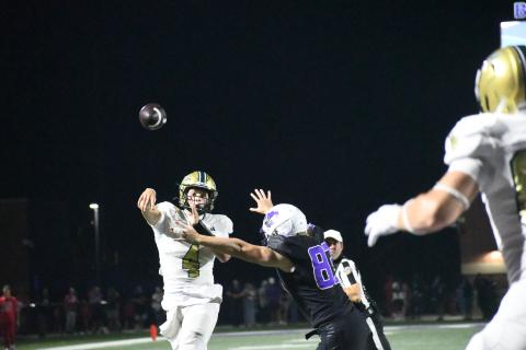 Wesley Branch/The Clayton Tribune. Rabun Gap quarterback Grayson Clary looks for tight end Cash Washburn on a 2-point conversion during Rabun Gap’s 31-15 loss to Brownsburg on Aug. 28. Clary completed 18-of-29 passes for 206 yards, one touchdown and two interceptions in the loss. RGNS will be at home on Friday, Sept. 4, against Baylor.