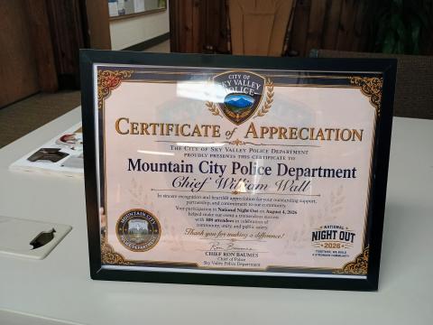Megan Horn/The Clayton Tribune. The Sky Valley Police Department presented this Certificate of Appreciation to Mountain City Police Department Chief William Wall. 