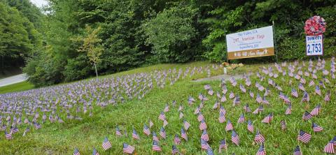 Photo courtesy of Sky Valley Mayor Benita Cotton-Orr. To honor those lives lost during the Sept. 11, 2001, terrorist attacks, volunteers placed  2,977 flags on the lawn at Sky Valley City Hall, commemorating the innocent victims of the terrorist attacks. People locally and nationally will take a moment Friday to reflect back 25 years ago.