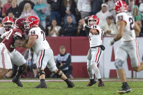 Photo via Ken Ward/DawgTime. UGA and former Rabun County quarterback Gunner Stockton releases a pass downfield during Georgia’s 20-17 win versus Alabama on Oct. 17. Stockton scored two total touchdowns and had 261 total yards.