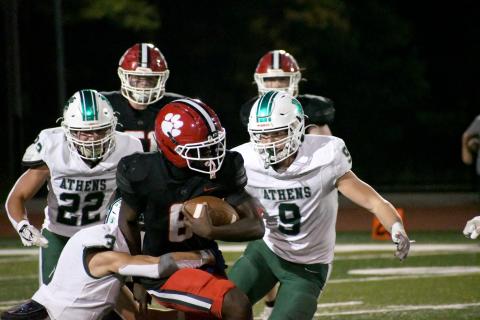 Wesley Branch/The Clayton Tribune. Rabun County senior running back and linebacker JK Fruster runs through the Athens Academy defense during the Wildcats’ Oct. 9 win versus Athens Academy. Rabun County will face Commerce on the road on Oct. 16.
