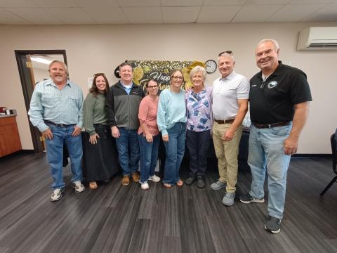 Megan Horn/The Clayton Tribune. Many community members and county officials congratulated Senior Center and Transit Director Wanda Henry on her retirement after 20 years. Pictured are Rabun County Building and Grounds Director Steve Bryson, left; Rabun County Administrative Finance Clerk/Accounts Payable Amanda Crane; CFO David Conley; County Clerk Linda Ramey; Assistant Finance Officer Danielle Justice; Henry; County Administrator Darrin Giles and Commissioner Kent Woerner. 