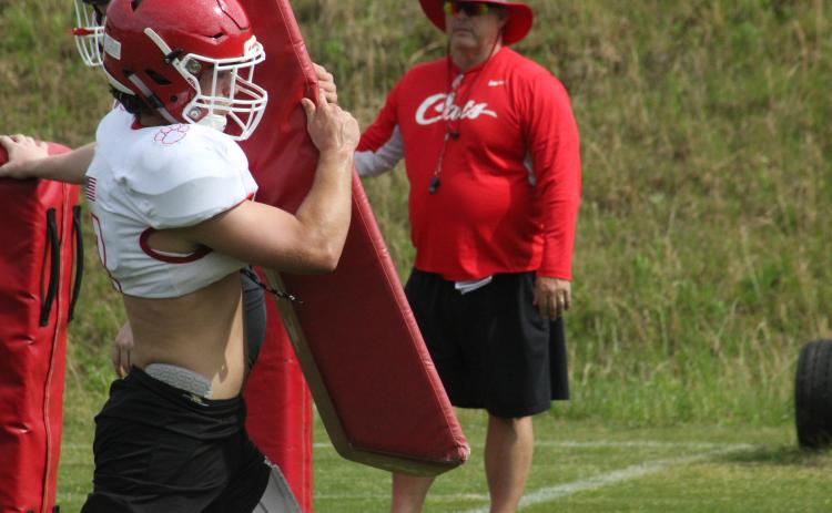 Rabun County linebacker AJ Wheeler participates in a tackling drill during a practice in May. (Glendon Poe/The Clayton Tribune)