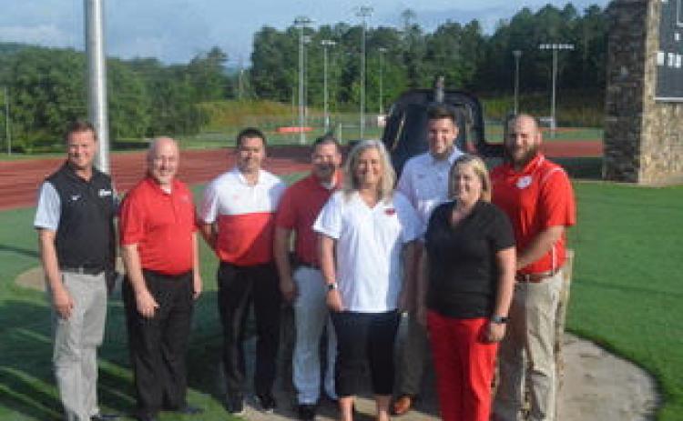 Wayne Knuckles/The Clayton Tribune. Allen Blair, back left, assistant principal of Rabun County High School (RCHS), Dr. Jay Fowler, principal of Rabun County Primary School (RCPS), Jonathan Gibson, assistant superintendent, Marty Dixon, transportation director, Justin Spillers, principal of RCHS, and John Franco, assistant principal of Rabun County High School. (front) Dr. April Childers, superintendent, and Kelly McKay, assistant superintendent.