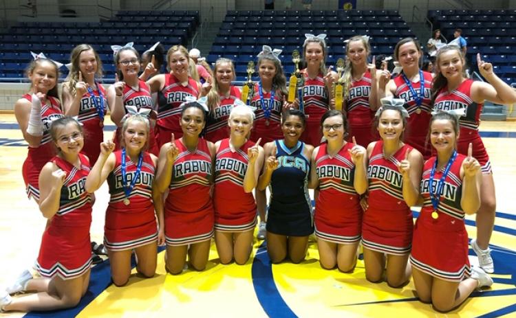 Rabun County cheerleaders are, in back, from left, Rainny Patterson, Kasten Weems, Savanna Sullivan, Cassidy Richardson, Brianna Henslee, Miya Stewart, Faith Cofield, Carley Smith, Willow Fisher, Laurel Justus; in front, from left, are Ayla Jarrard, Jaycee Weber, Keianna Owens, Haley Hunt, Jailah Zanders (Universal Cheerleaders Association), Elizabeth Scruggs, Josie Darnell and Maci Varnadoe. (Submitted Photo)