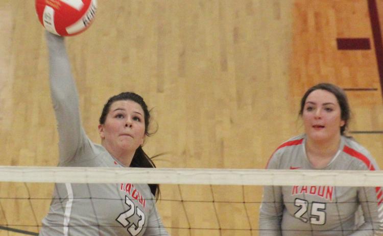 Destiny Deetz (23) attempts a kill while teammate Lyndee Hollifield (25) looks on during a match against Prince Avenue Christian at Ken Byrd Court in Tiger on Tuesday night. (Glendon Poe/The Clayton Tribune)