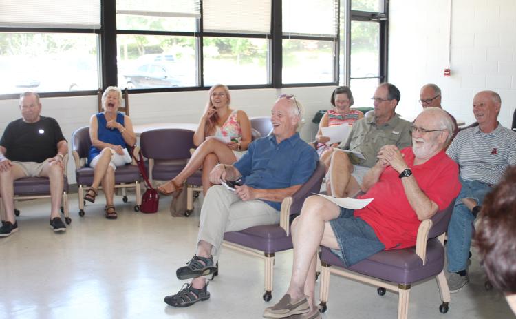 Megan Broome/The Clayton Tribune. A crowd of people from the community gathers at an informational forum for aspiring candidates and listens to potential candidates running for city council seats in Clayton and Dillard on August 16 in Clayton.